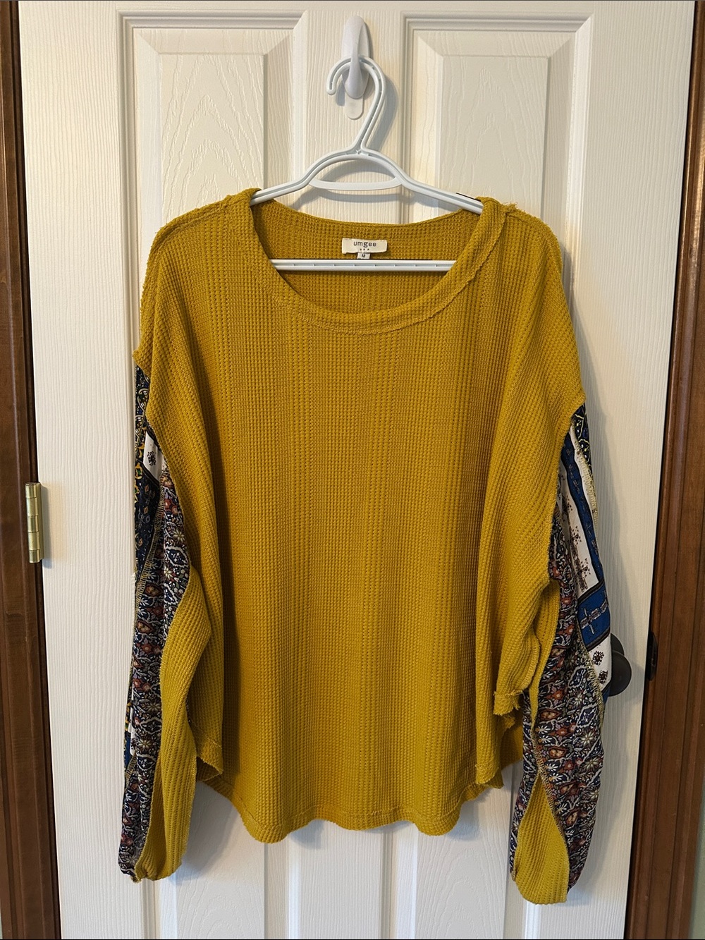 Umgee Mustard Waffle Knit Pullover with Patterned Sleeve Panels